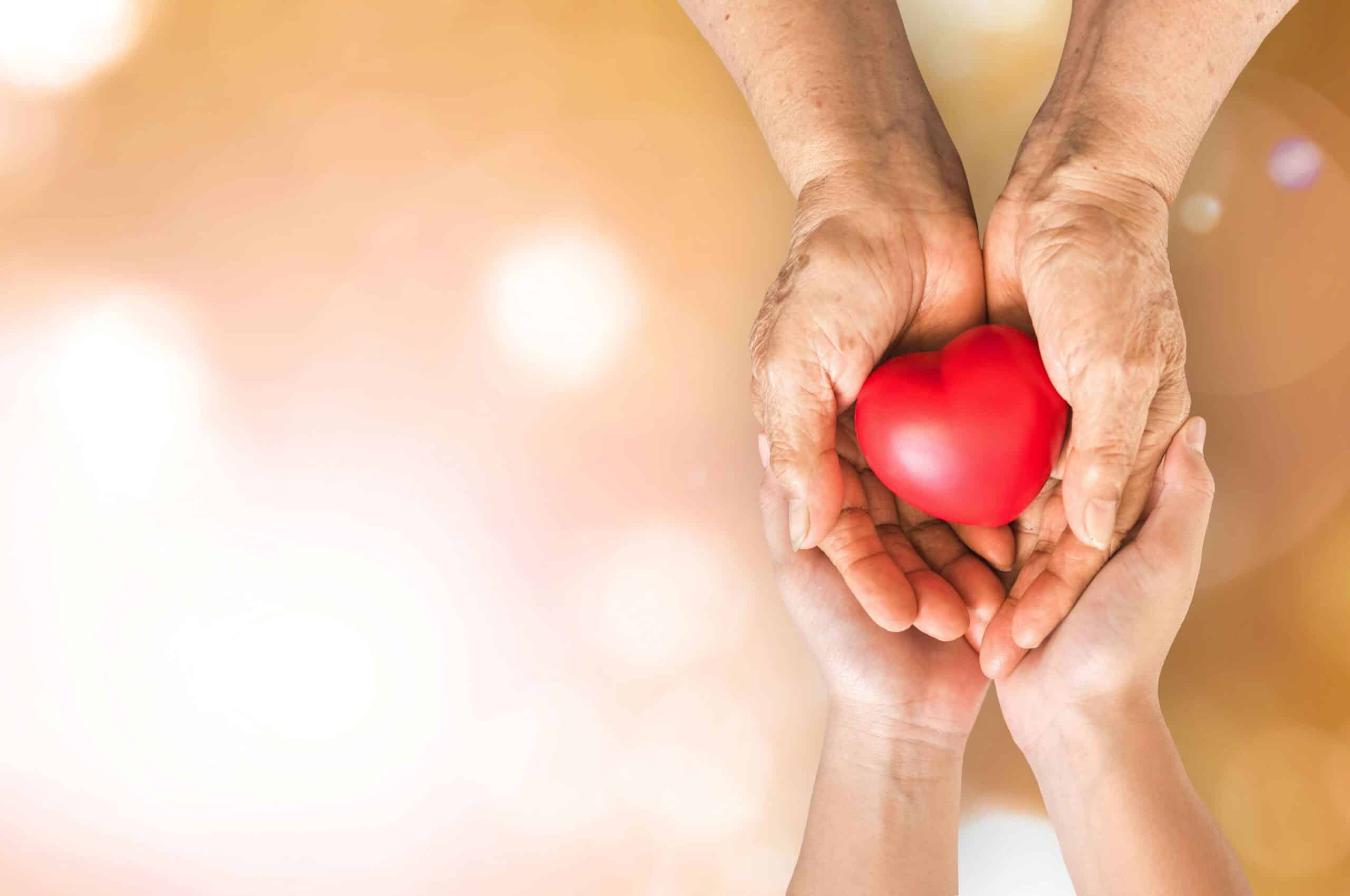 In-home-care-digital-marketing hands holding heart shaped object