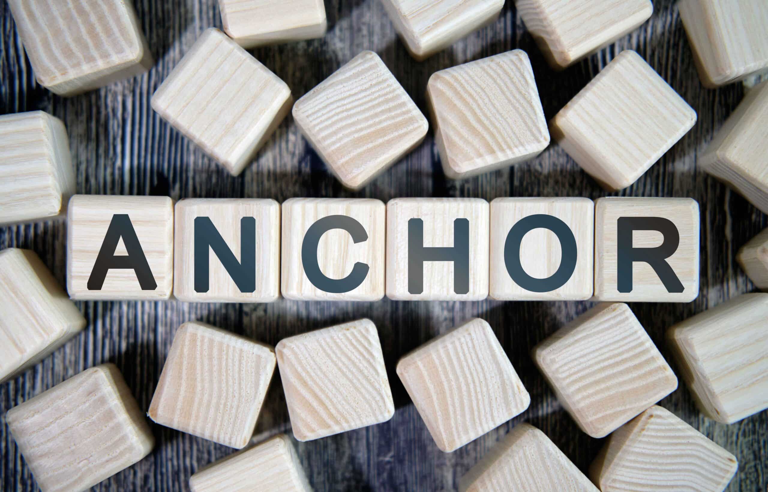 Anchor-Text A wooden block with the word anchor written on it.